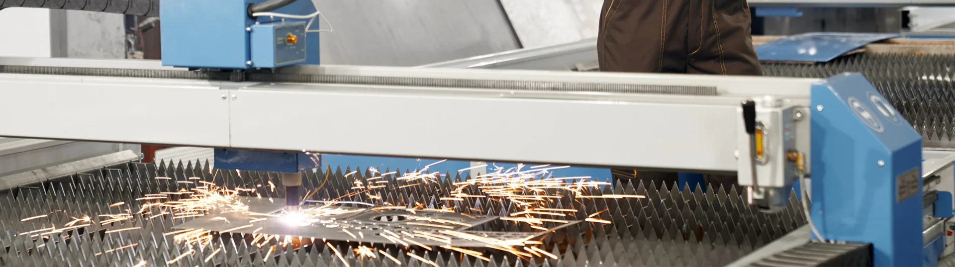 Laser cutting services banner with machinery